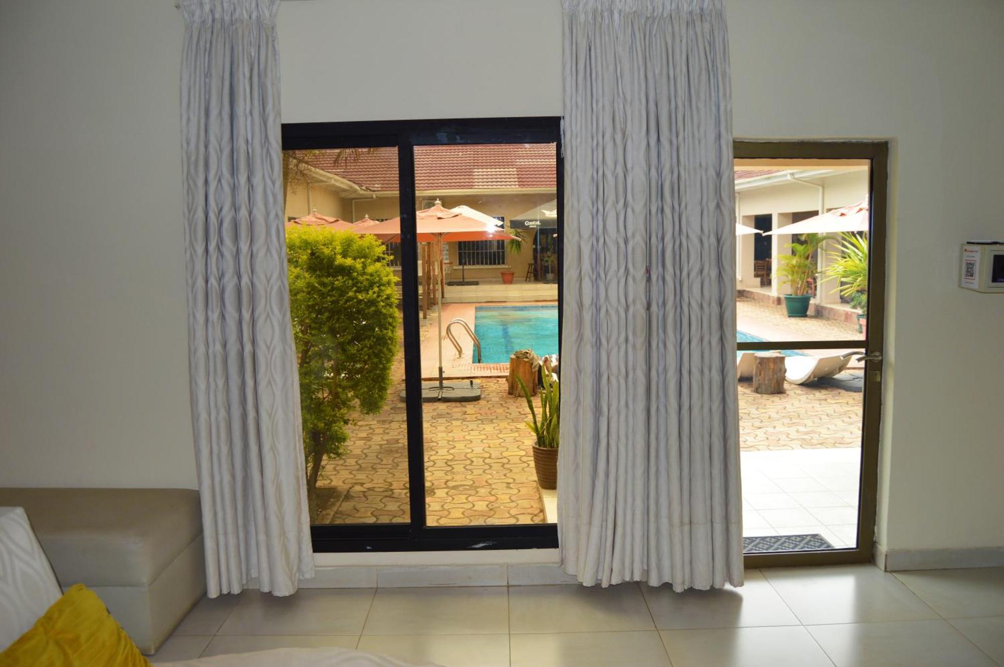 Bougainvilla Boutique Hotel & Restaurant Lubumbashi Bagian luar foto